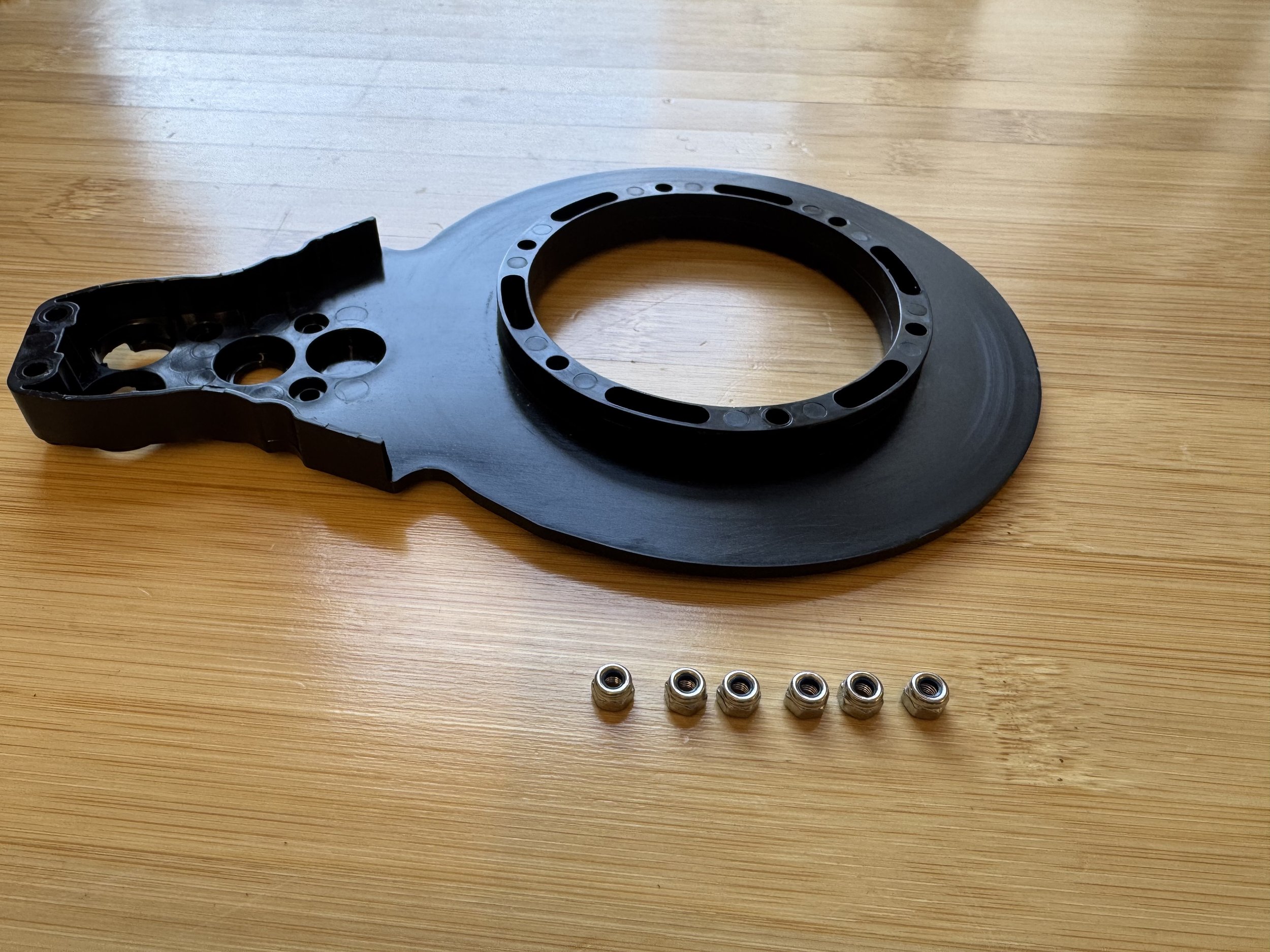 Installing six locking nuts in a new arm half