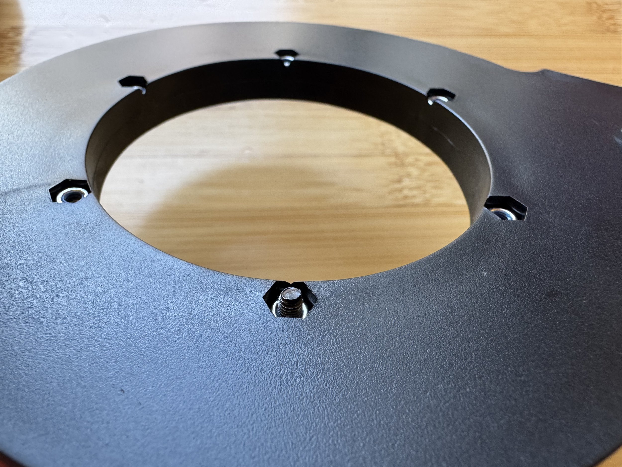 Pulling the nuts into place with a bolt
