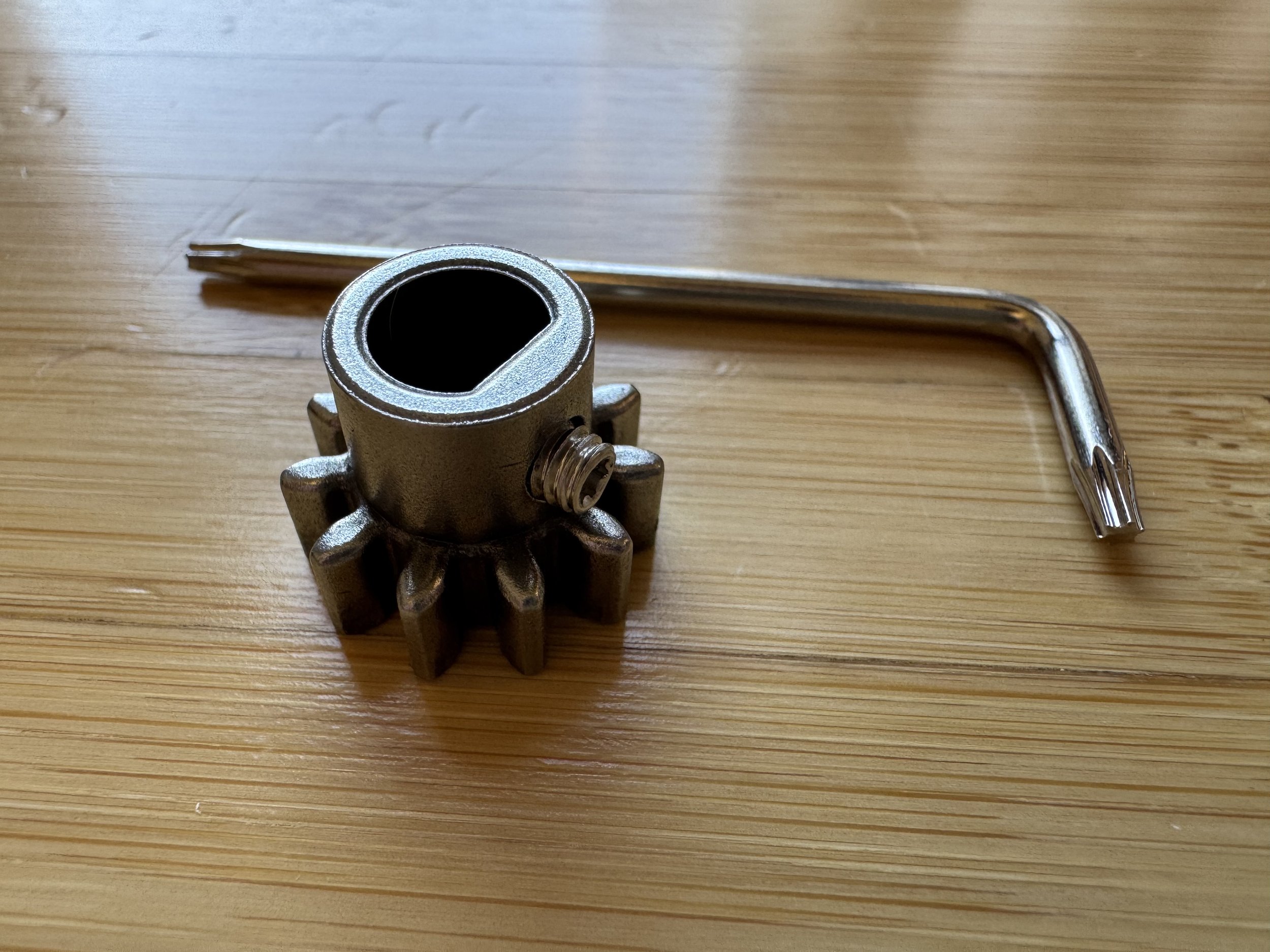 Threading the set screw into the drive gear