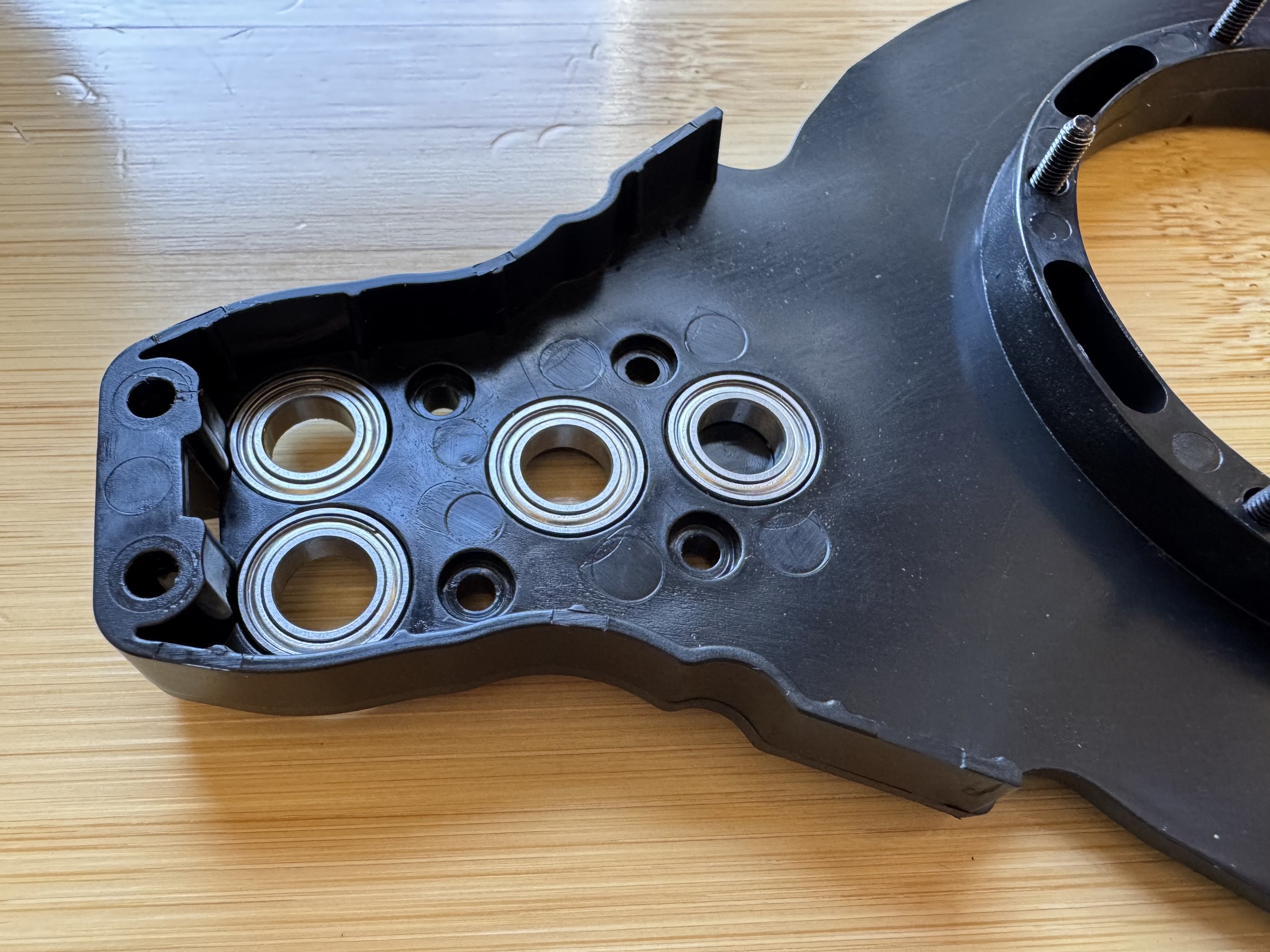 Pressing four bearings into the other half