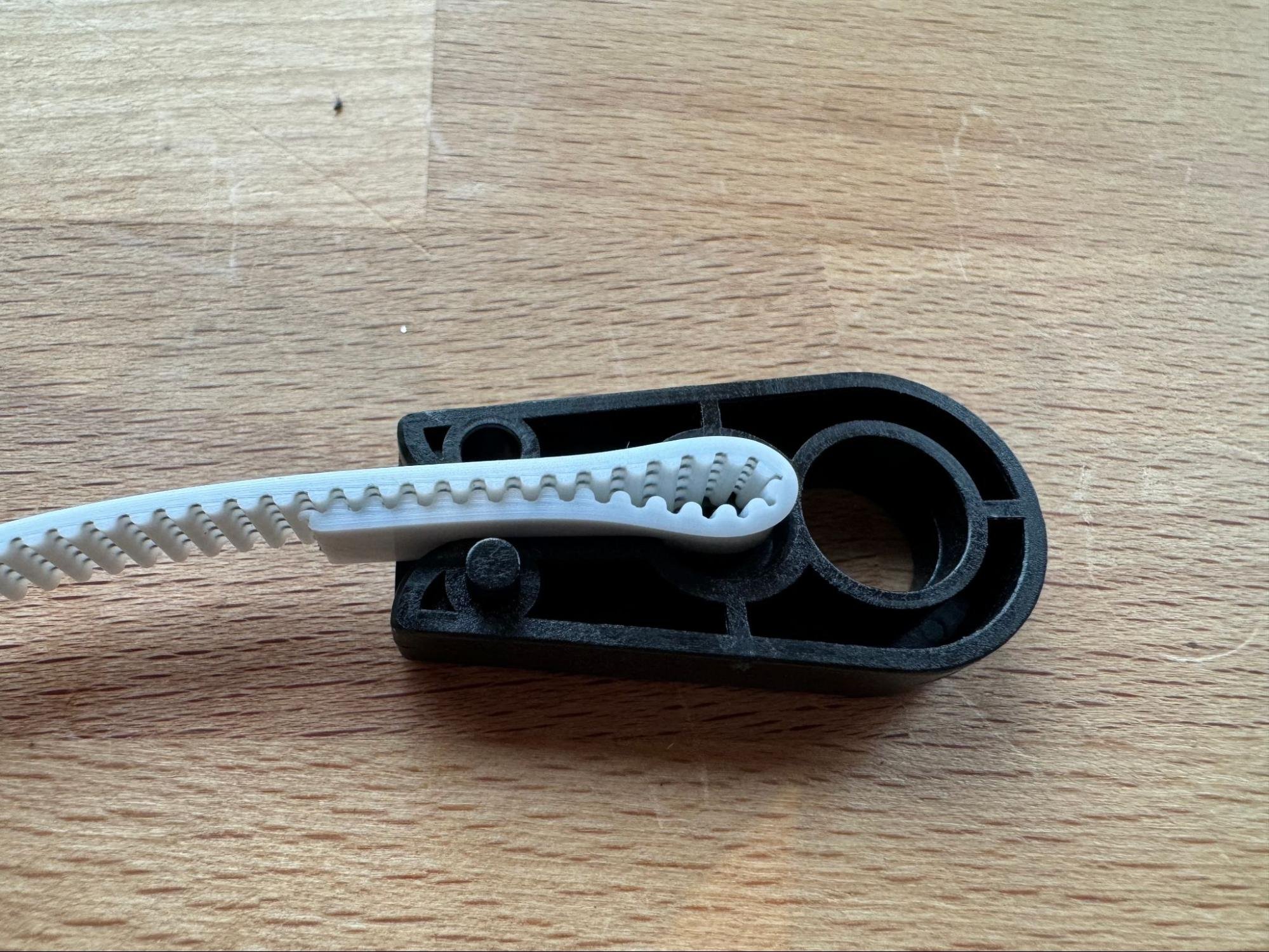 Folding the belt into the belt end slot