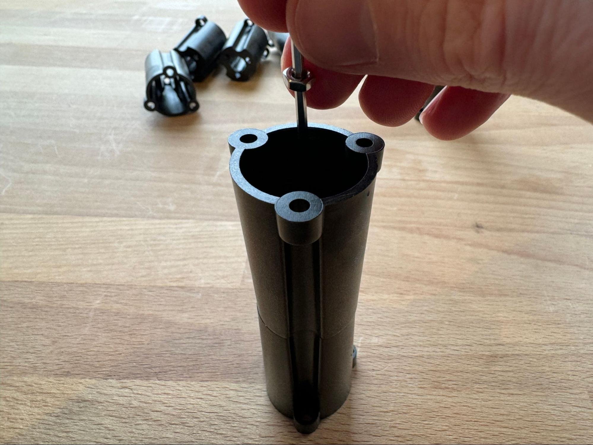 Guiding nuts into the upright recesses
