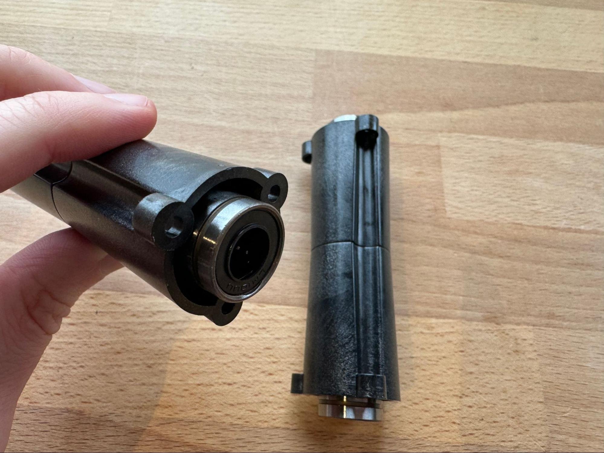 Pressing a linear bearing into each end