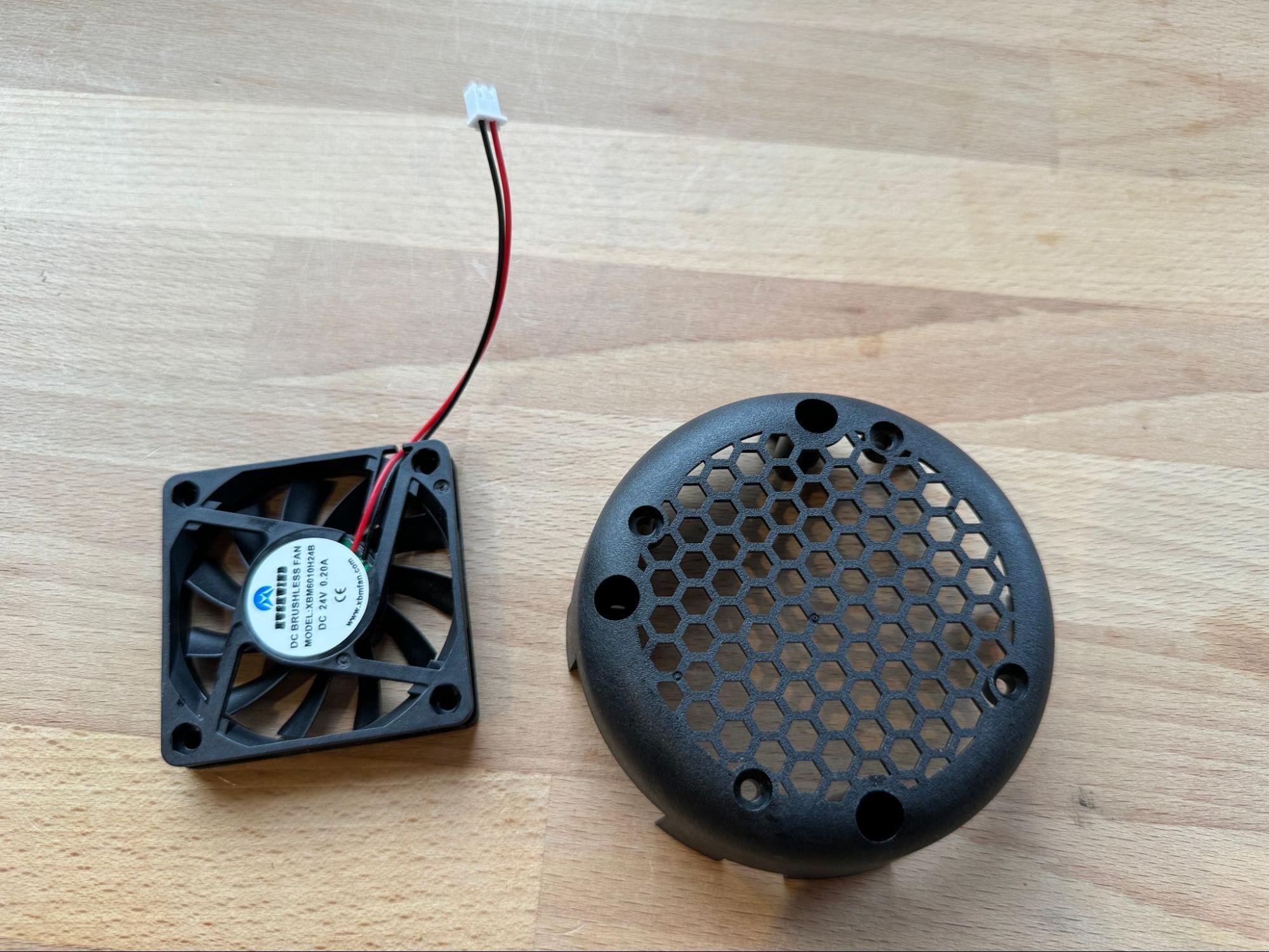 The cooling fan and PCB cover