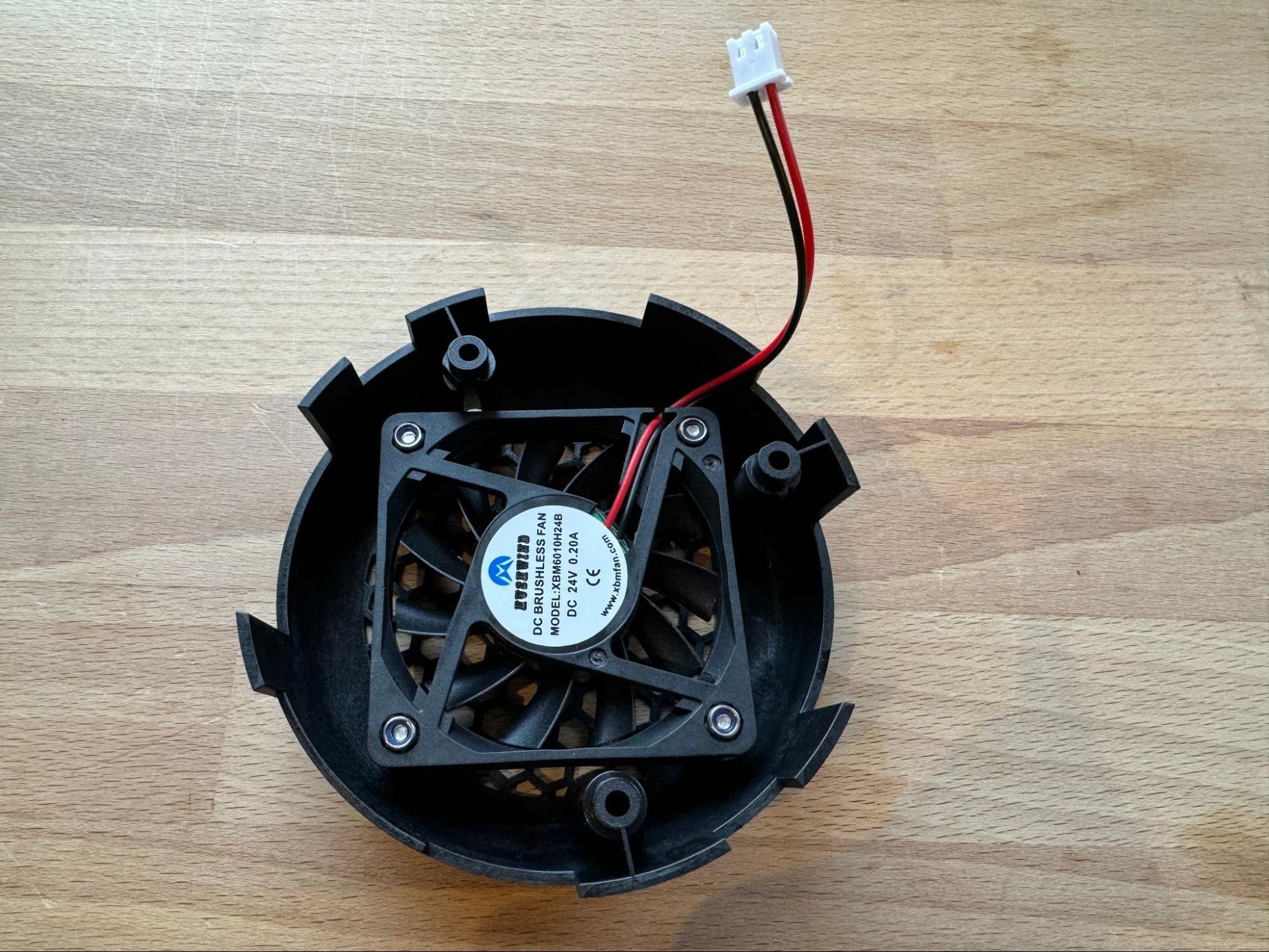 Bolting the cooling fan into the cover