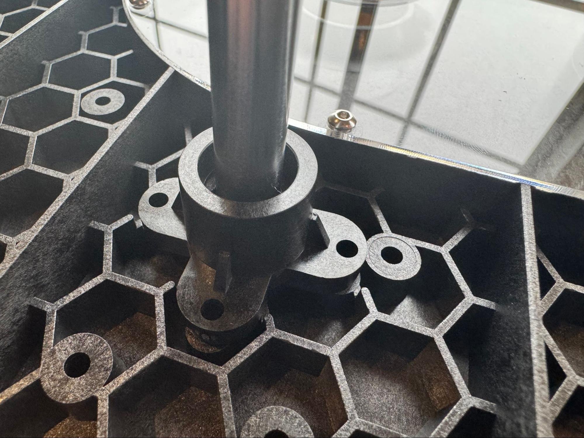 Pressing the linear rod clamps into place